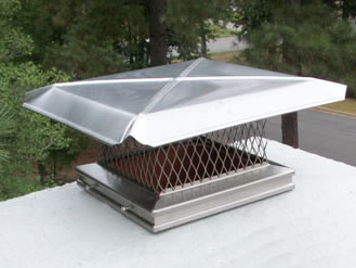 One chimney cap installed on the top of chimney, the metal sheet acts as the cap cover, its four sides are downward.