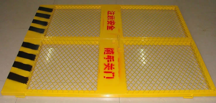 One yellow safe guard with two doors, it is made of raised expanded metal, and painted with red safety tips slogan.