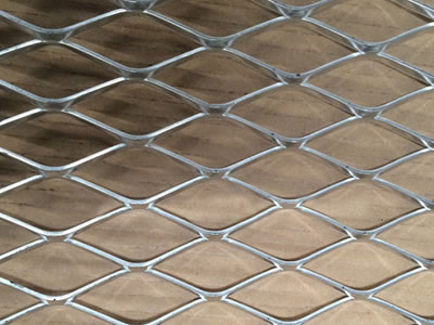 Raised stainless steel expanded metal mesh of 18 gauge (1.2 mm) thickness.
